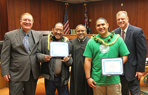 Pictured above: Criminal defense attorney Jonathan Burge (left), Judge William M. Domingo (center), and DUI defense attorney and DWI Court Committee Member R. Patrick McPherson (right), congratulate recent DWI Court graduates.