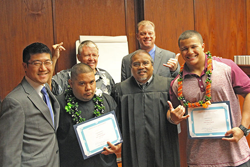 Judge Domingo and 3 attorneys congratulate 2 DWI Court graduates April 21, 2016.