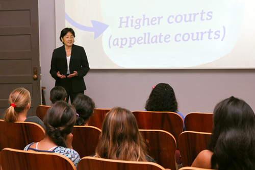Intermediate Court of Appeals Associate Judge Lisa Ginoza with 6th grade students visiting the Judiciary History Center, Sept. 13, 2017.