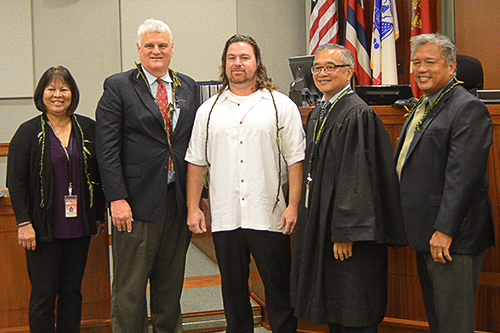 Fifth Circuit Judge Kathleen Watanabe, Chief Justice Mark Recktenwald, Fifth Circuit Chief Judge Randal Valenciano, District Court Judge Edmund Acoba with Kauai Veterans Treatment Court’s first graduate, 05/17/2019.