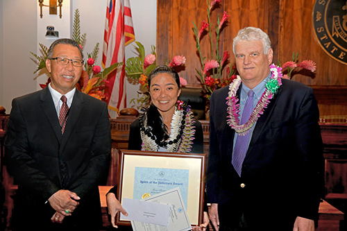 Lori Tamanaha, Social Worker IV / TRO Court Officer, Adult Client Services Branch / TRO unit, First Circuit (Oahu) Family Court - Kapolei, with Intermediate Court of Appeals Associate Judge Derrick H.M. Chan and Hawaii Supreme Court Chief Justice Mark E. Recktenwald, in the Supreme Court courtroom, 09/30/2019.