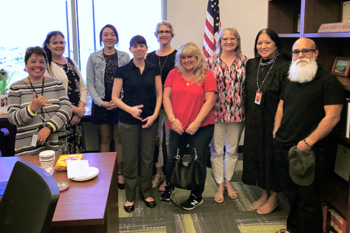 Judge Margaret Masunaga and law librarian Lisa Rosile with seven librarians who visited the Keahuolu Courthouse Law Library, 03/02/20.