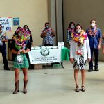 Fifth Circuit Deputy Chief Judge Michael K. Soong stands with 10 graduates at the 35th Kauai Drug Court graduation ceremony on 05/29/2020 at the Kauai Courthouse. All stand six feet apart and are wearing masks.